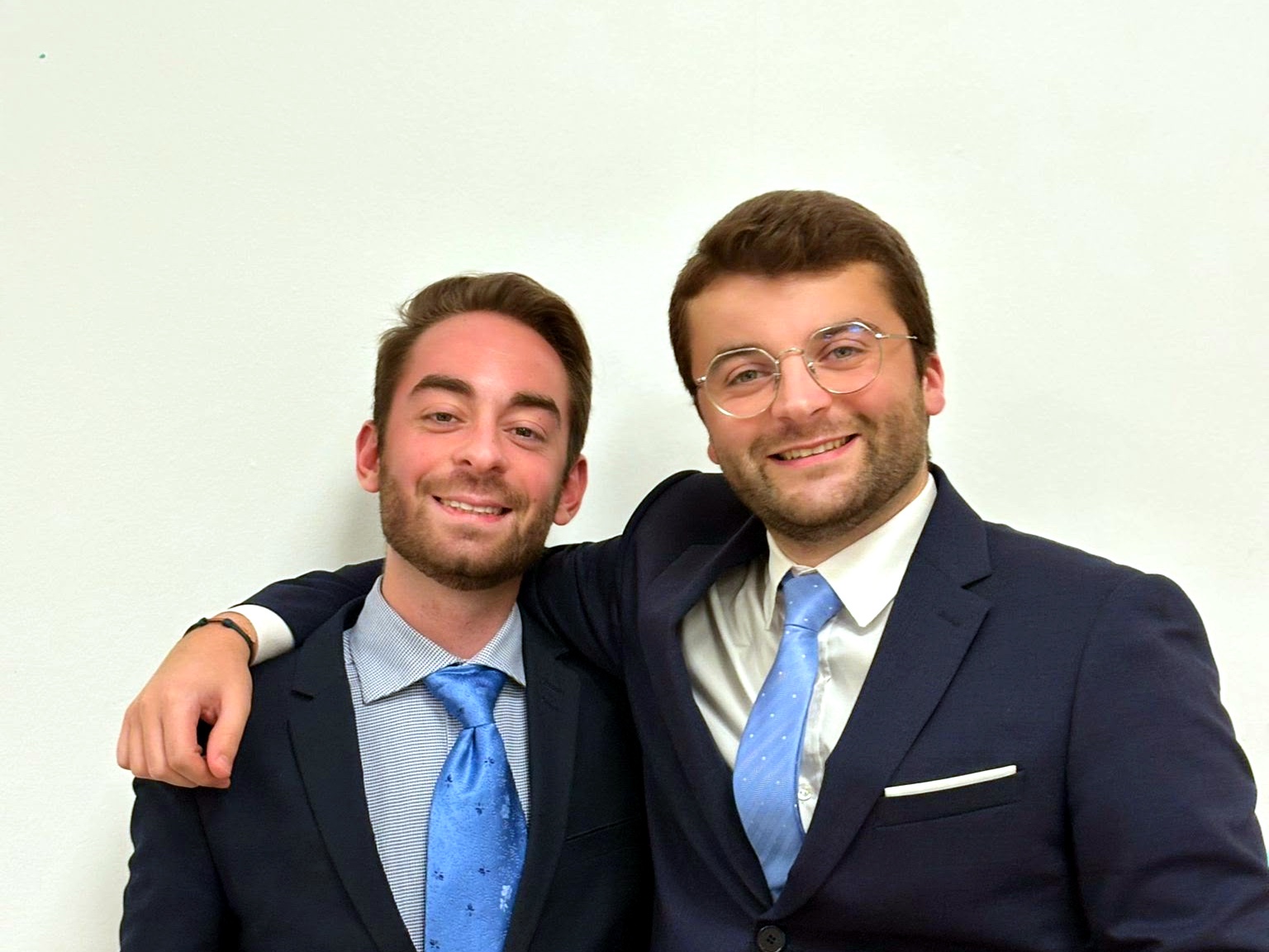 Two private-service professionals in a luxury interior